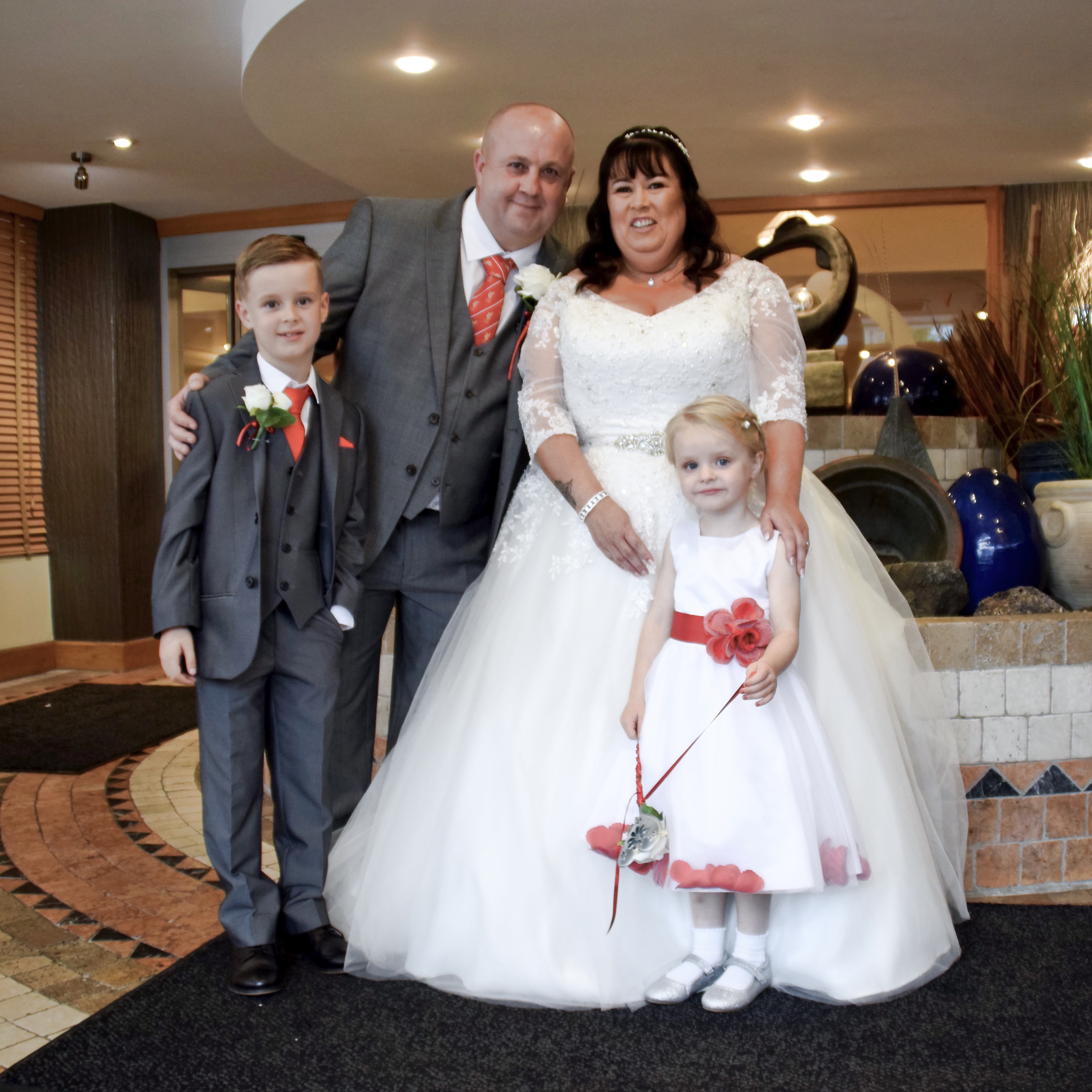 Bride, groom and grandchildren