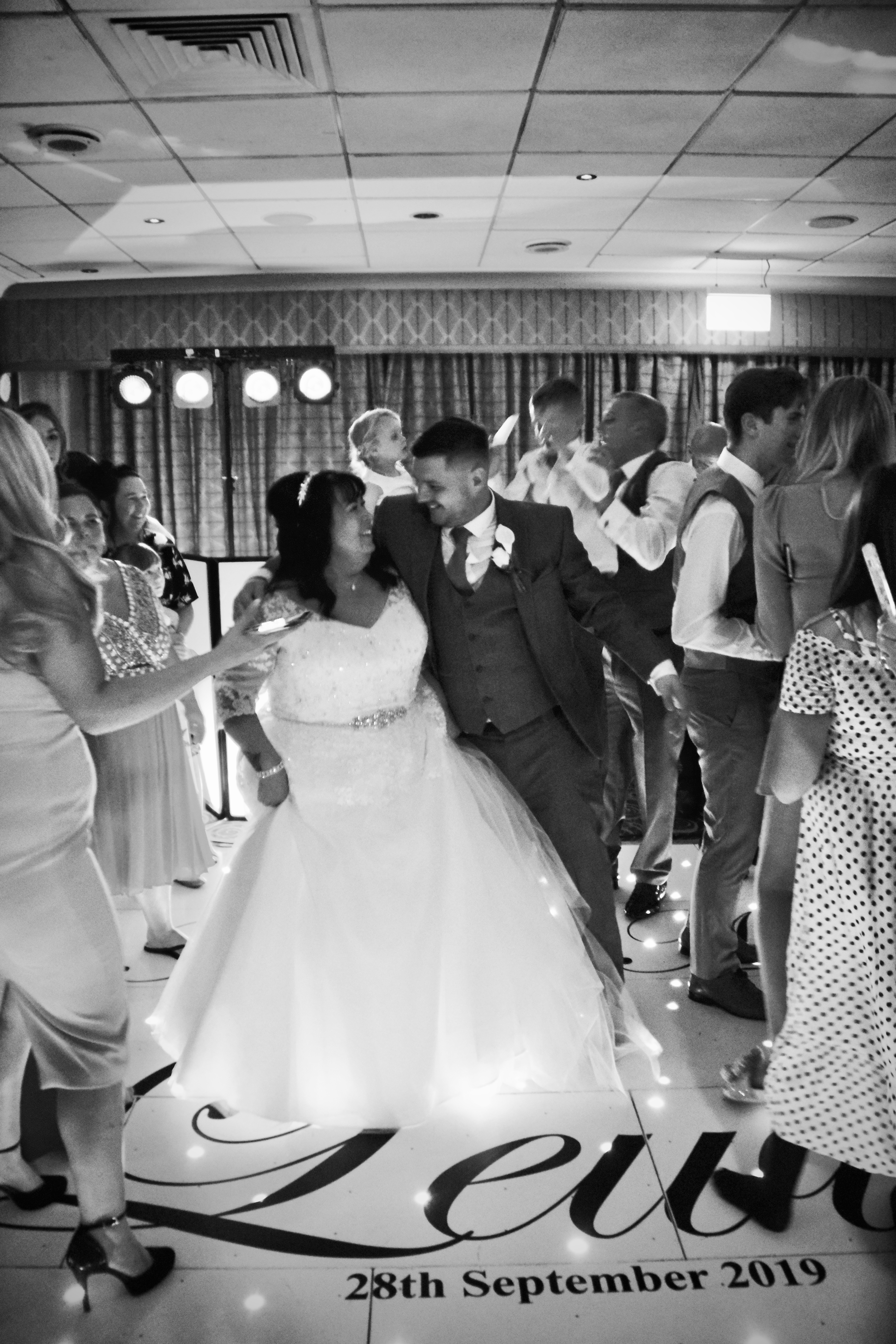 Bride & son dancing